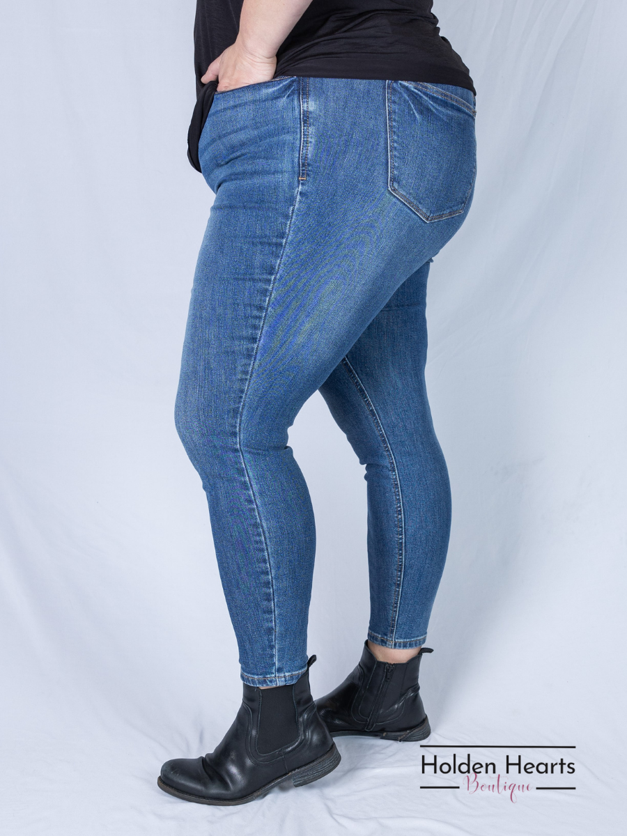 All in the Details Mid Rise Skinny Jeans